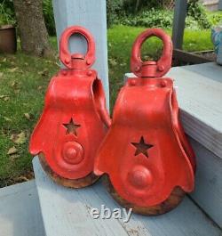 2 Antique Vintage Starline Cast Iron And Wood Barn Pulleys. Nice