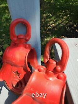 2 Antique Vintage Starline Cast Iron And Wood Barn Pulleys. Nice