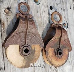 2 antique matching myers ok h-298 cast and wood barn hay pulleys trolleys