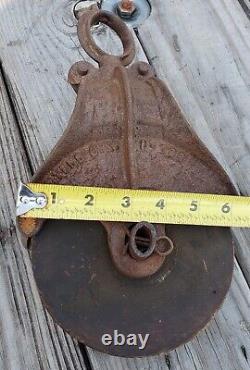 2 antique matching myers ok h-298 cast and wood barn hay pulleys trolleys