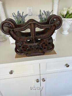 ANTIQUE BARN PULLEY CAST IRON. Great Wine bottle holder! Nice Finish
