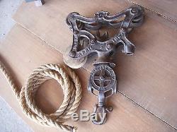 Antique barn hay trolley pulley / antique ney hay trolley with track and rope