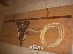 Antique barn hay trolley with rope