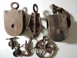 Antique barn pulleys, wood, cast iron and zinc large and small lot of 5