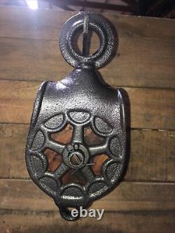 Antique vintage cast iron and wood barn pulley