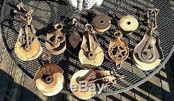 Cache of antique pulleys