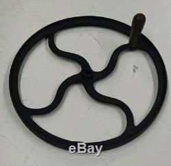 Large antique/primitive cast iron #3 hand crank flywheel. (19.75 in diameter)