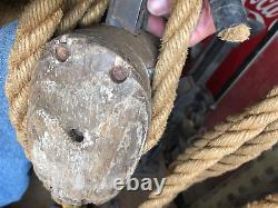 Large, old block and tackle, wood blocks, approx 150' of 1 rope, not bad conditiion