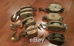 Lot of 7 Assorted Antique Vintage Wood And Cast Iron Barn Pulleys block & tackle