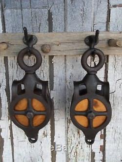 TWO Antique Cast Iron AND WOOD BARN HAY TROLLEY ORNATE LINE PULLEYS RUSTIC DECOR
