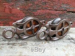 TWO Antique/VINTAGE CAST Iron AND WOOD PULLEYS ORNATE RUSTIC DECOR