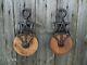 TWO Antique/VINTAGE PRIMITIVE CAST Iron AND WOOD PULLEYS ORNATE RUSTIC DECOR