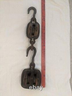 Unique antique, cast iron wrapped, single and double pulley block and tackle