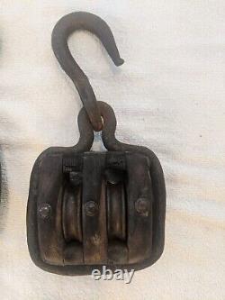 Unique antique, cast iron wrapped, single and double pulley block and tackle