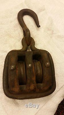 Unusual antique wood double block pulley framed in thick iron