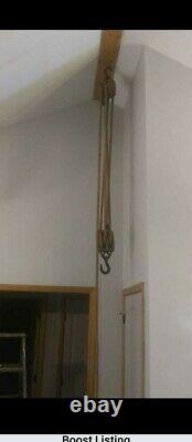 Vintage Pennsylvania Barn antique block and tackle pulleys with rope. Steampunk
