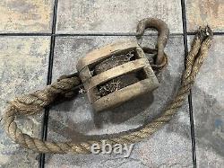 Vintage wood barn pulley with hook