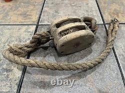 Vintage wood barn pulley with hook